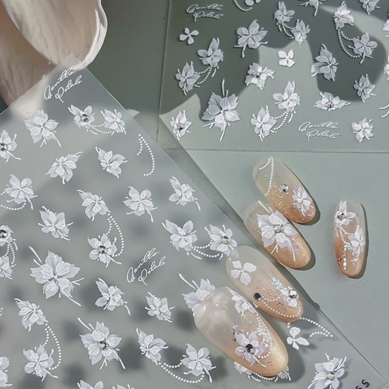 Elegante witte vlinderbloem na - Nail Art Elegant recensie en prijs